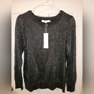 Glittery long sleeved black sweatshirt w/ shoulder padding  size L